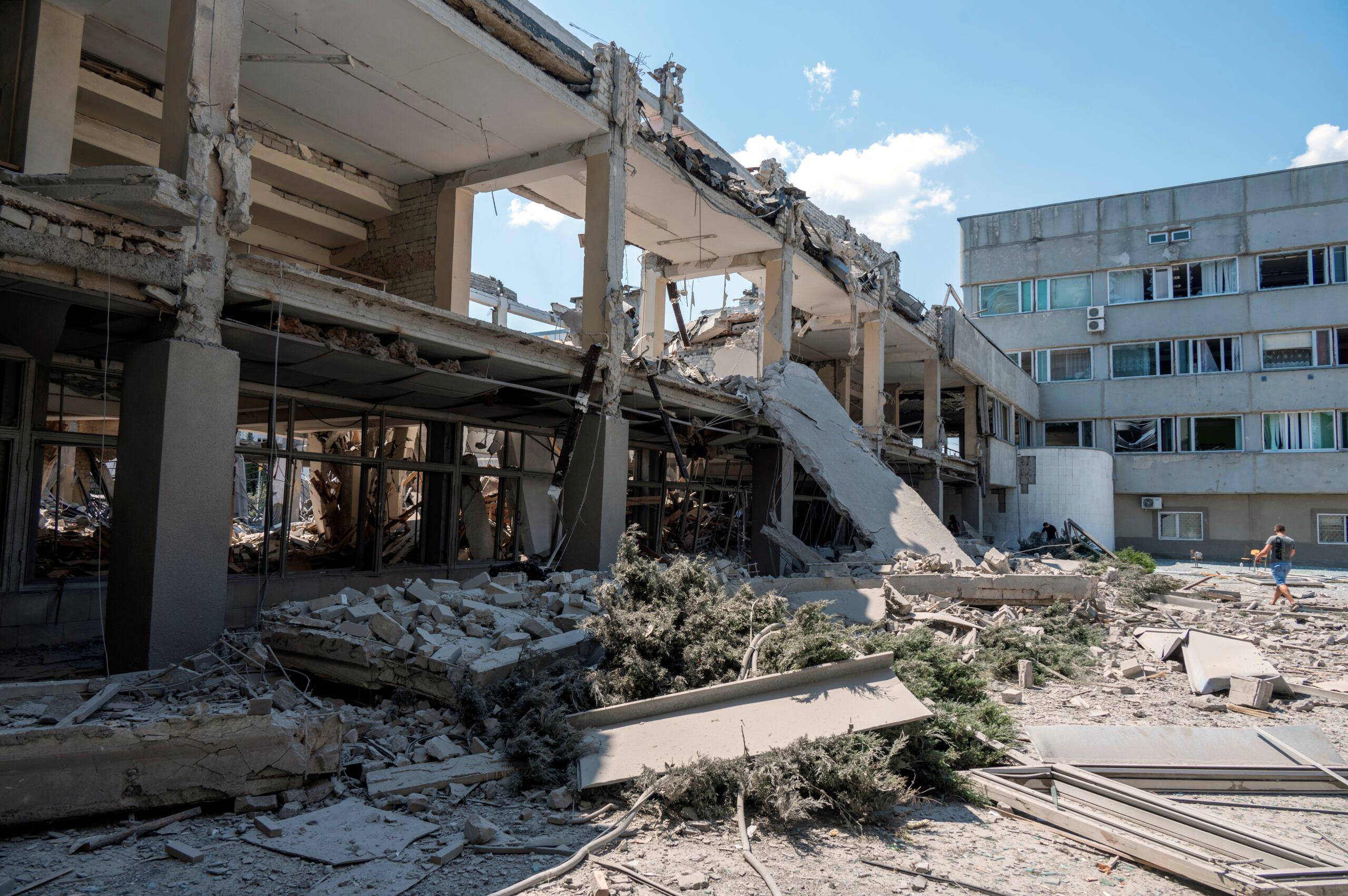 A photograph taken on June 6, 2022 shows the Kharkiv's Pedagogical University building destroyed by a missile hit in Kharkiv, amid the Russian invasion of Ukraine. - According to the prosecutor's office of the Kharkiv region, a 40-year-old watchman died as a result of the hit. (Photo by SERGEY BOBOK / AFP)