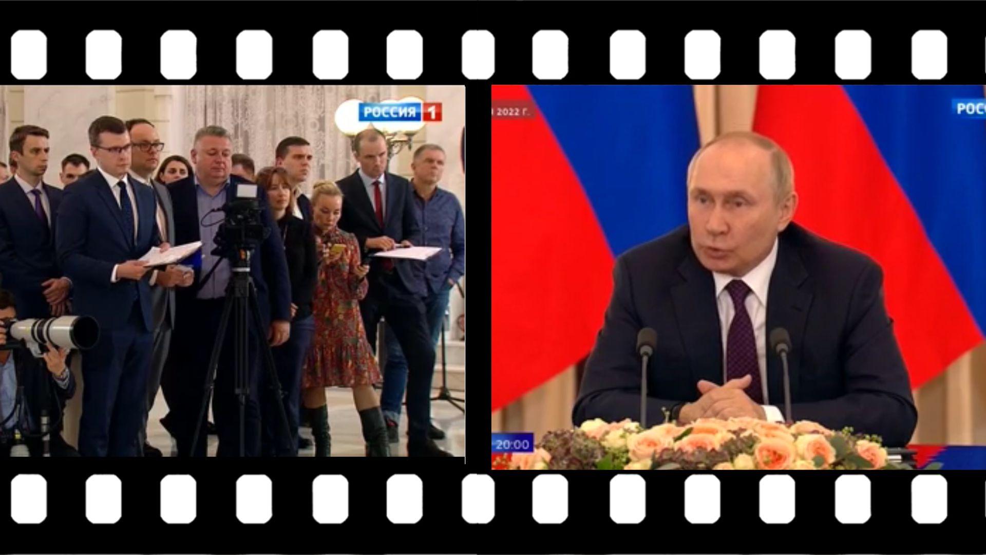 Stojący dziennikarze i siedzący Putin