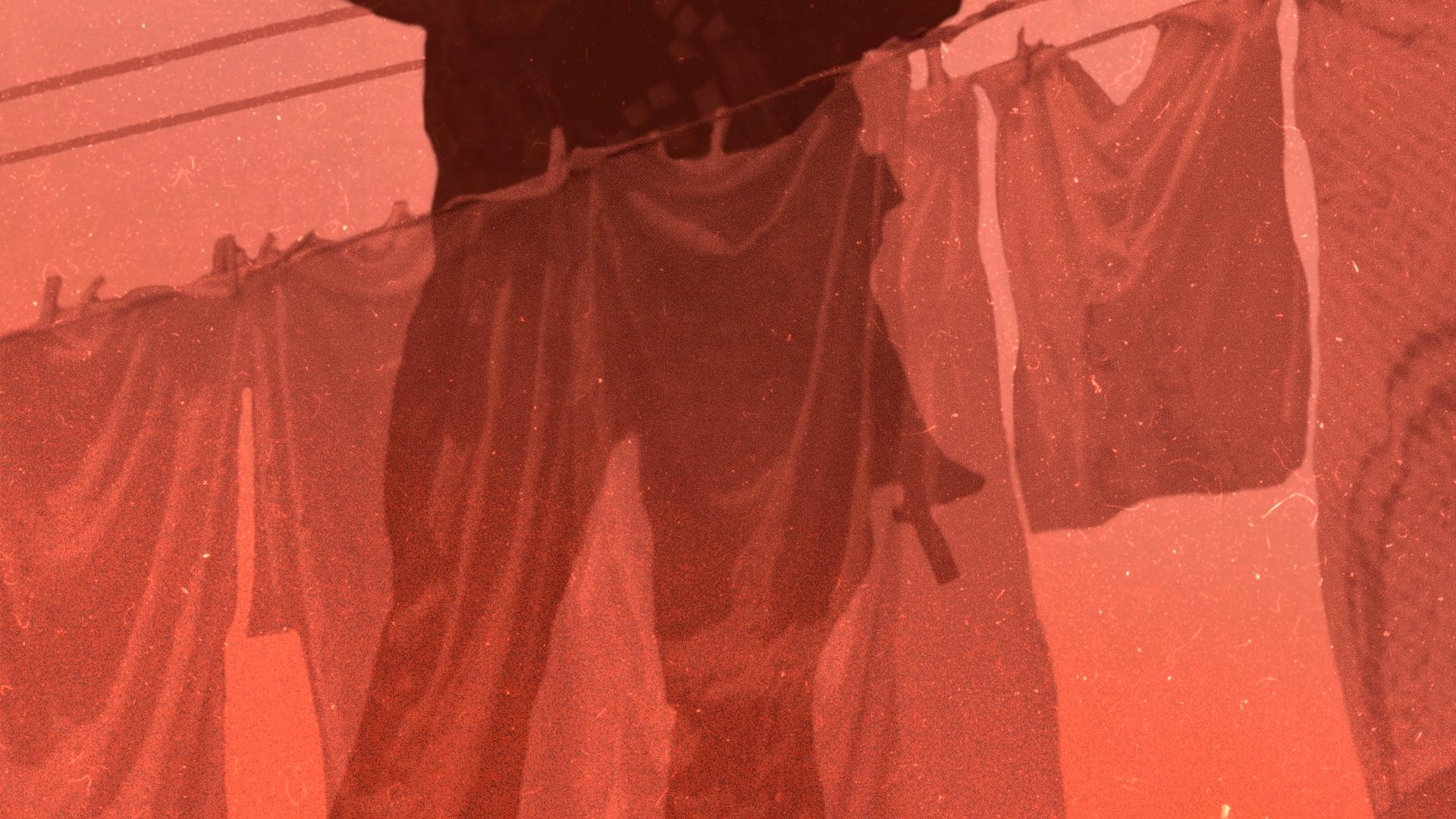 Ilustracja namalowana jest w brązowo-czerwonych barwach. Przedstawia wiszące na sznurku pranie, przez które widać cień osoby trzymającej karabin. Broń jest opuszczona na dół. Osoba jest widoczna tylko do wysokości ramion.
