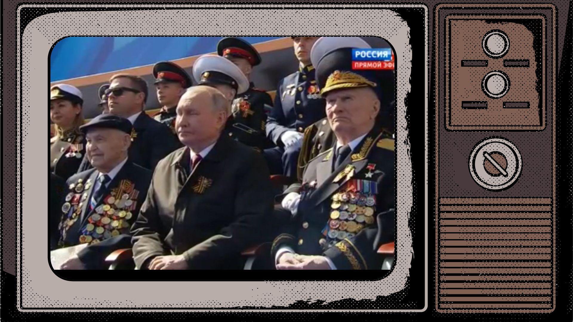 Grafika: zdjecie Putina w otoczeniu weteranów z medalami w ramce starego telewizora