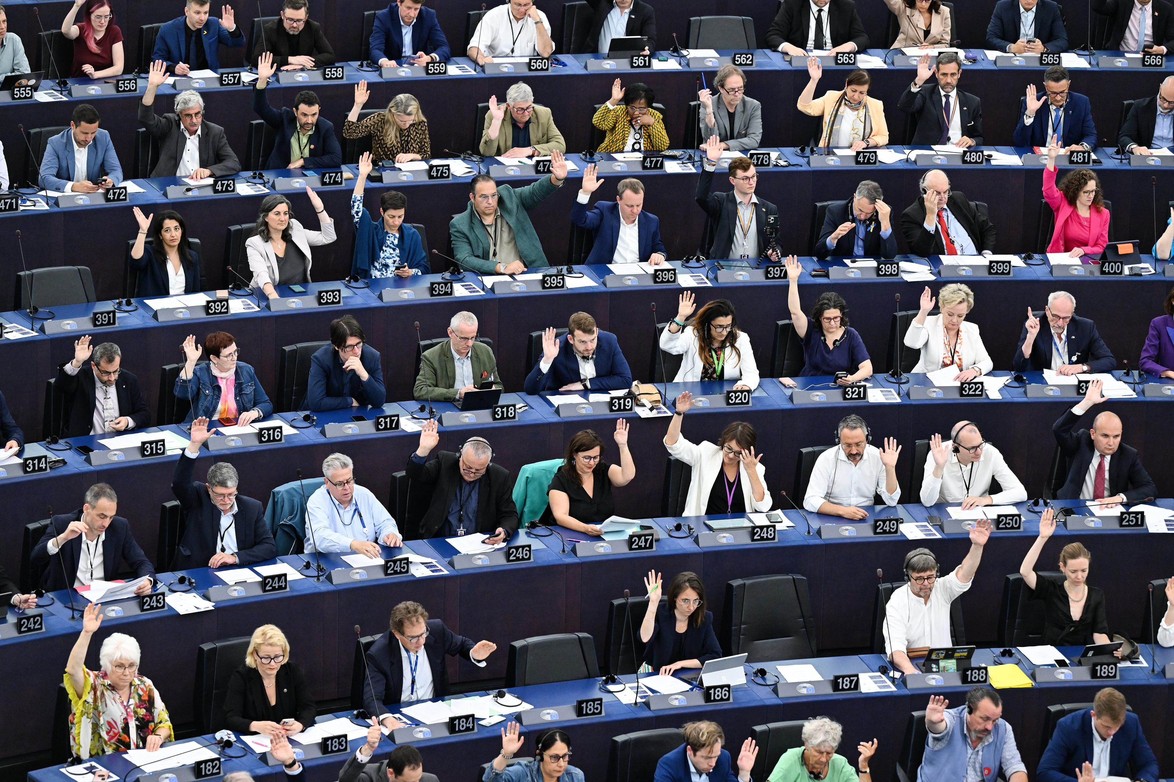 Members of the European Parliament take part in a voting session about Artificial Intelligence Act during a plenary session at the European Parliament in Strasbourg, eastern France, on June 14, 2023. -  (Photo by FREDERICK FLORIN / AFP)