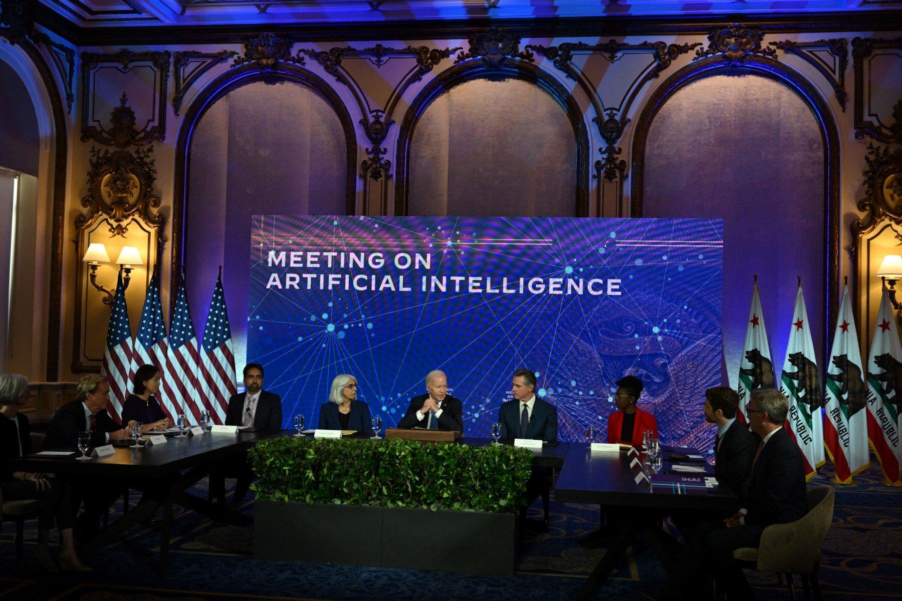 US President Joe Biden (C) takes part in an event discussing the opportunities and risks of Artificial Intelligence at the Fairmont Hotel in San Francisco, California, on June 20, 2023. (Photo by ANDREW CABALLERO-REYNOLDS / AFP)