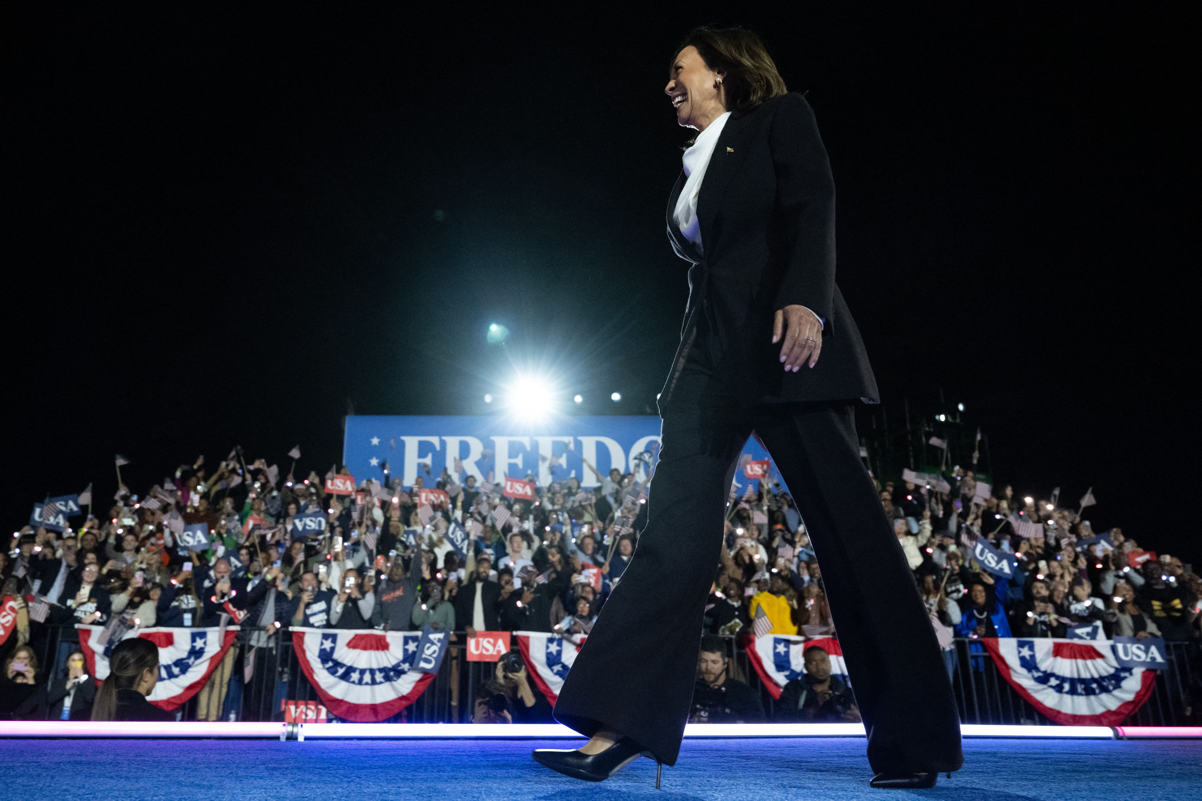 US Vice President and Democratic presidential candidate Kamala Harris arrives to speak on The Ellipse just south of the White House in Washington, DC, on October 29, 2024. - The Harris-Walz campaign is billing the speech as "a major closing argument" one week before the November 5 election. (Photo by SAUL LOEB / AFP)