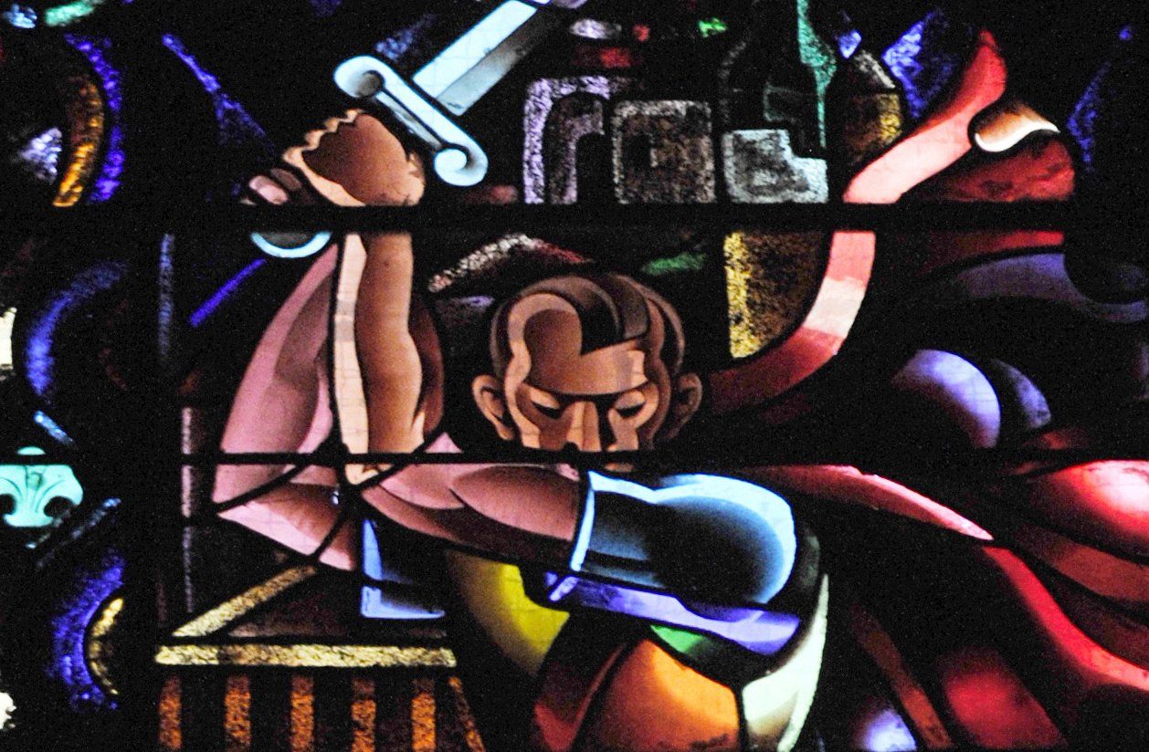 TO GO WITH A STORYBY JULIE CHABANAS
This picture taken on January 09, 2011 shows a stained-glass window portraying Adolf Hitler installed in 1941 in the choir of St James' church in Montgeron, northern France. Hitler is portrayed as Herod Agrippa, the brutal king of Judea, dressed in a blue Roman tunic and red cloak, wielding a sword that is about to behead the praying figure of St James the Apostle. AFP PHOTO BORIS HORVAT (Photo by BORIS HORVAT / AFP)