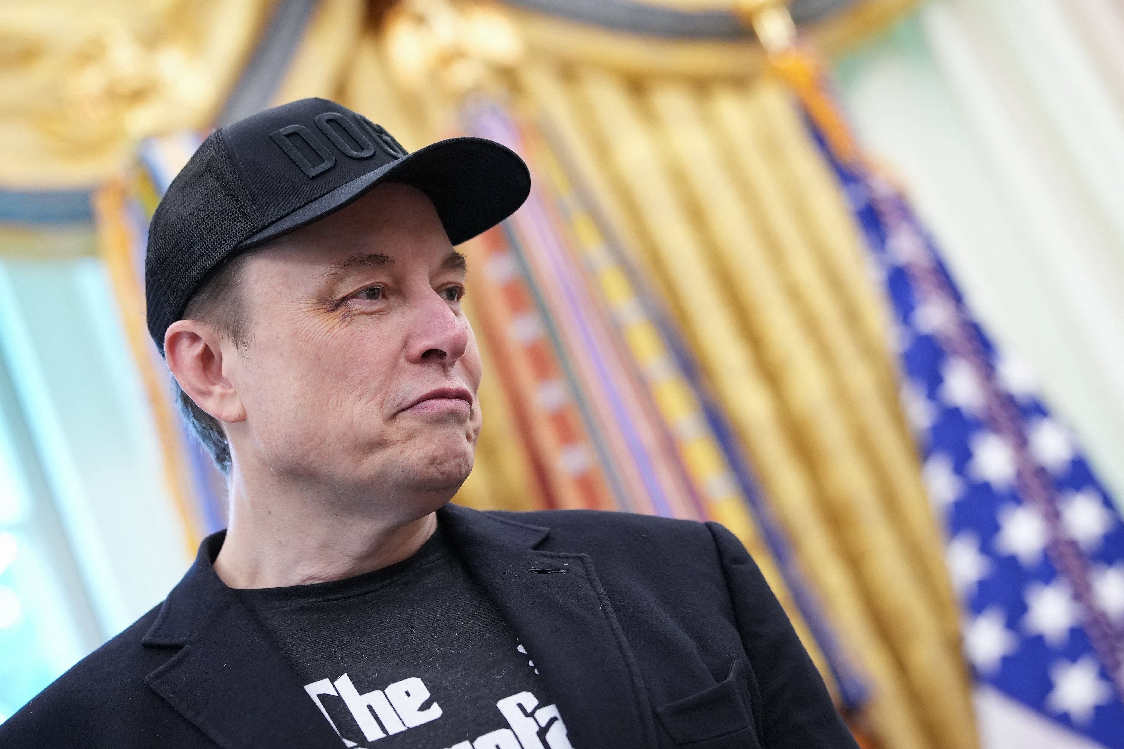 WASHINGTON, DC - MAY 30: Tesla CEO Elon Musk listens as U.S. President Donald Trump speaks to reporters in the Oval Office of the White House on May 30, 2025 in Washington, DC. Musk, who served as an adviser to Trump and led the Department of Government Efficiency, announced he would leave his role the Trump administration to refocus on his businesses.   Kevin Dietsch/Getty Images/AFP (Photo by Kevin Dietsch / GETTY IMAGES NORTH AMERICA / Getty Images via AFP)