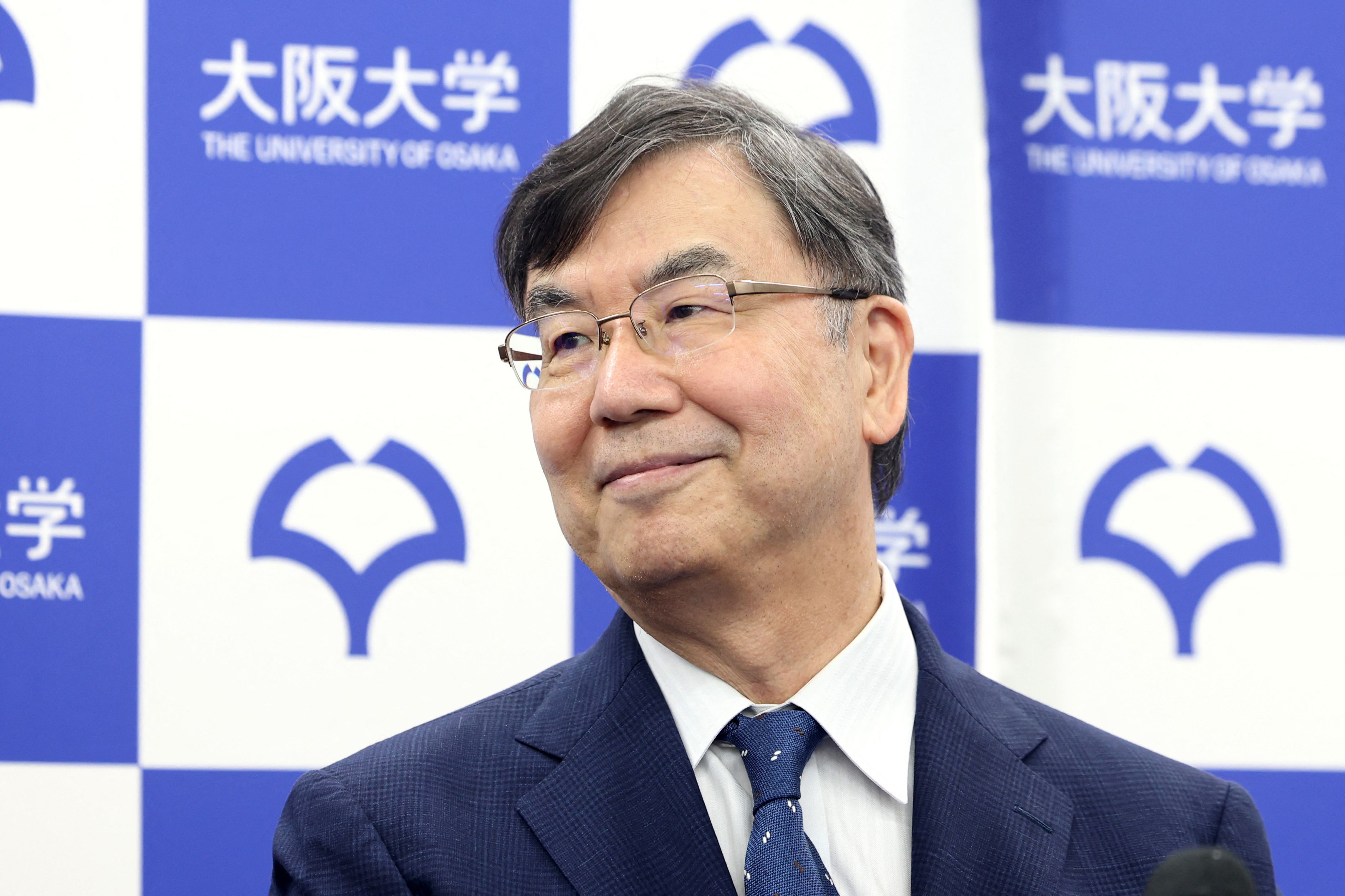 Shimon Sakaguchi, an immunologist and a distinguished professor of Osaka University, attends a press conference after winning the 2025 Nobel Prize in medicine, in Suita, Osaka prefecture on October 6, 2025. Sakaguchi, the Japanese immunologist who won this year's Nobel Prize in medicine, said October 6 he hoped the award will help further advance research and patient care. (Photo by PAUL MILLER / AFP)