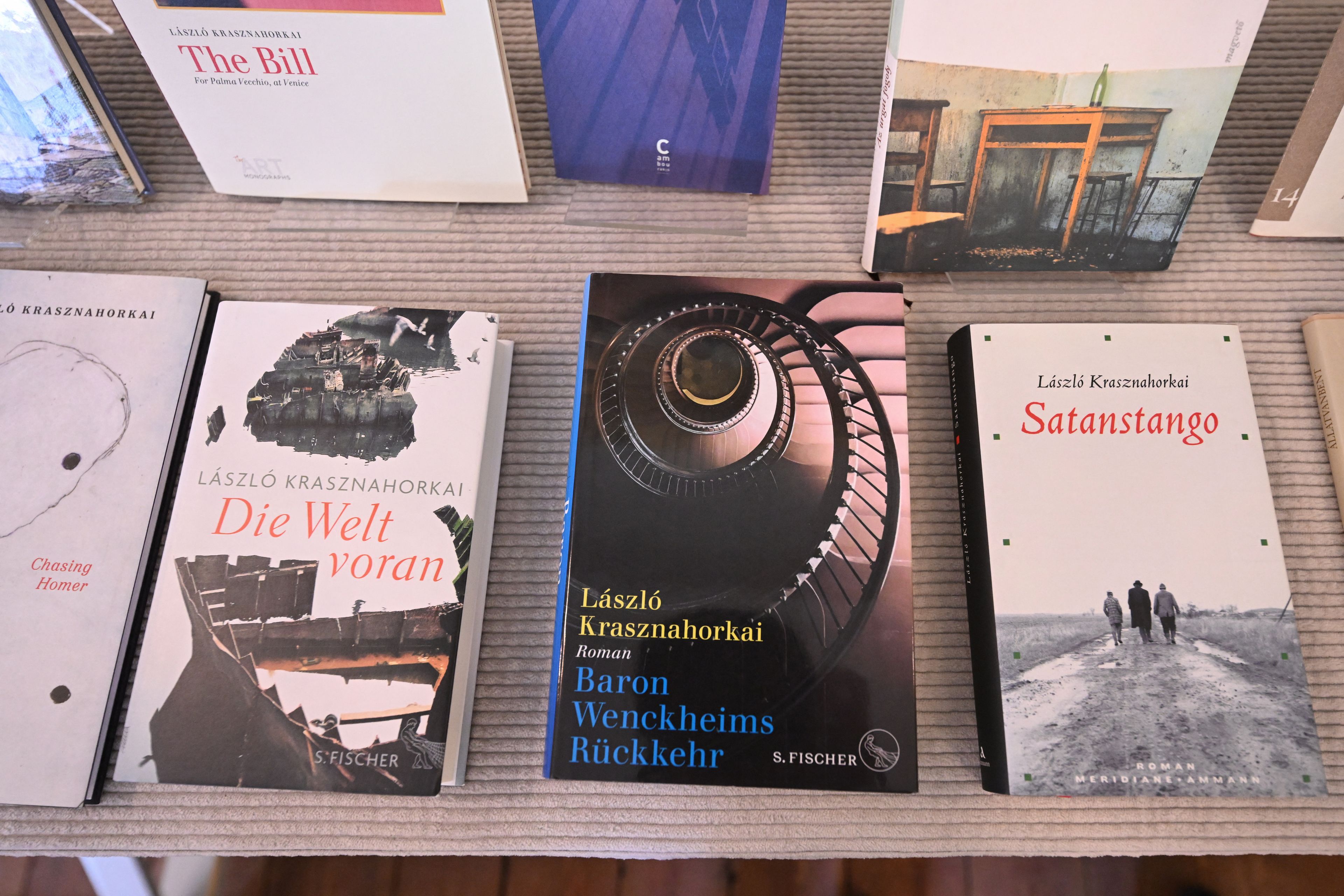 Books of Hungarian writer Laszlo Krasznahorkai, the winner of the 2025 Nobel Prize in Literature, are on display at the Swedish Academy in Stockholm, Sweden, on October 9, 2025. (Photo by Jonathan Nackstrand / AFP)