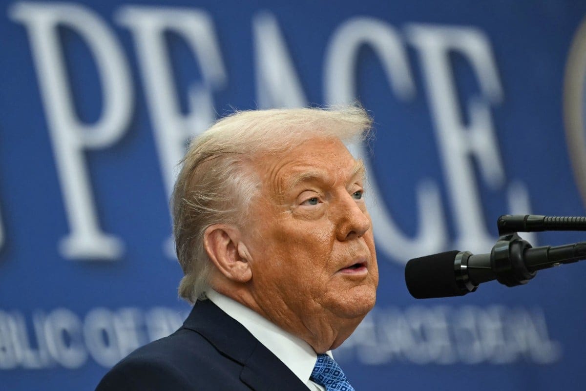 US President Donald Trump speaks during a signing ceremony of a peace deal with the President of Rwanda Paul Kagame and the President of the Democratic Republic of the Congo Felix Tshisekedi at the United States Institute of Peace in Washington, DC, on December 4, 2025. Trump on Thursday brings the leaders of Rwanda and the Democratic Republic of Congo together to endorse a deal that Trump has hailed as his latest peace triumph despite ongoing violence on the ground. Trump hopes the agreement will pave the way for the United States to gain access to critical minerals in the eastern DRC, a violence-torn region home to many of the key ingredients in modern technologies such as electric cars. (Photo by ANDREW CABALLERO-REYNOLDS / AFP)