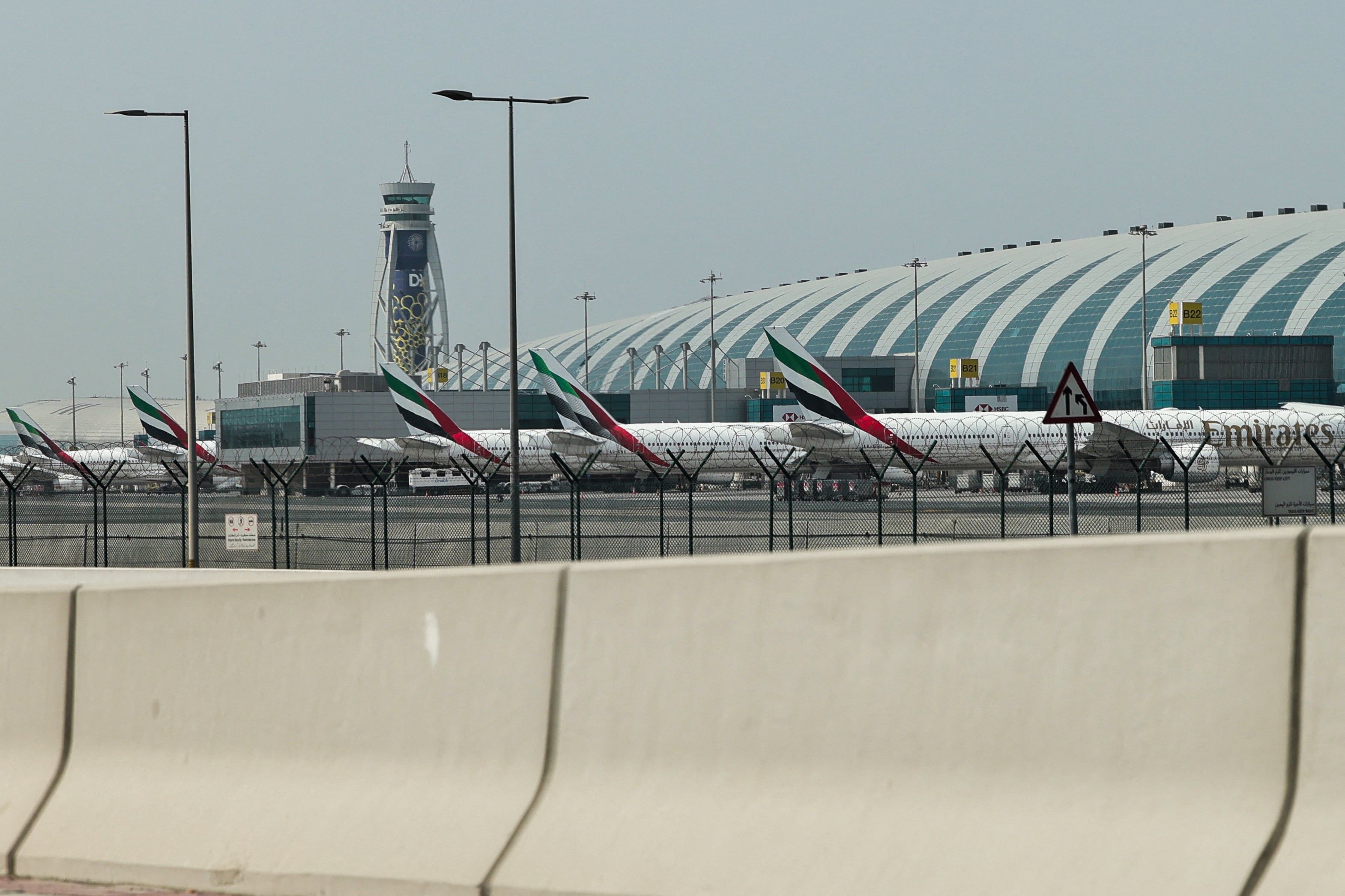 Emirates airline planes are parked on the tarmac at Dubai International Airport in Dubai on March 2, 2026. Israel bombarded Lebanon on March 2 following rocket fire from Hezbollah, several American warplanes crashed in Kuwait and Iran lashed out against the region with missiles, as the war with Israel and the United States expanded. (Photo by Fadel SENNA / AFP)