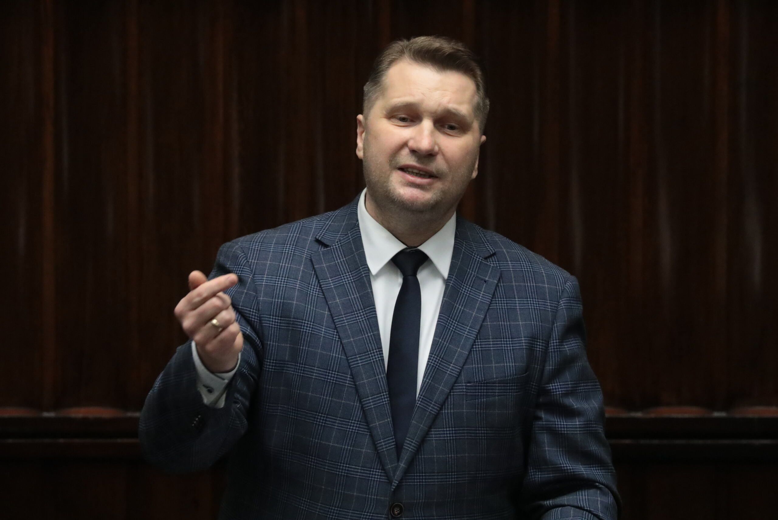12.01.2022 Warszawa , ulica Wiejska . Sejm . 46 . posiedzenia Sejmu IX kadencji . Minister edukacji i nauki Przemyslaw Czarnek podczas debaty w sprawie ustawy '' lex Czarnek ''.