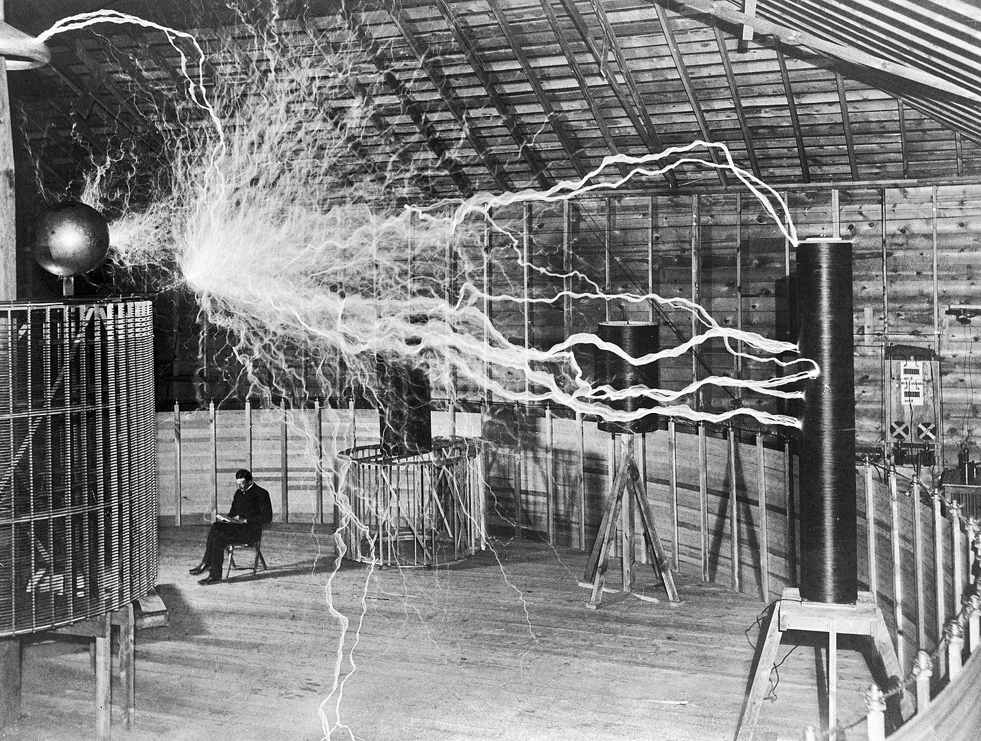 M0014782 Nikola Tesla, with his equipment.Credit: Wellcome Library, London. Wellcome Images.images@wellcome.ac.uk.http://wellcomeimages.org.Nikola Tesla, with his equipment for.producing high-frequency alternating currents..Inscribed: 'To my illustrious friend Sir William Crookes of whom I always think and whose kind letters I never answer! Nikola Tesla June 17, 1901'.Photograph.1901 Published:  - ..Copyrighted work available under Creative Commons Attribution only licence CC BY 4.0 http://creativecommons.org/licenses/by/4.0/